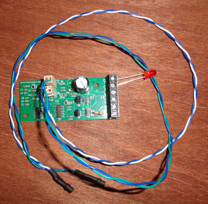 shows the infra red emmitter and detector connected by wires to the IRDOT-1 circuit board.
